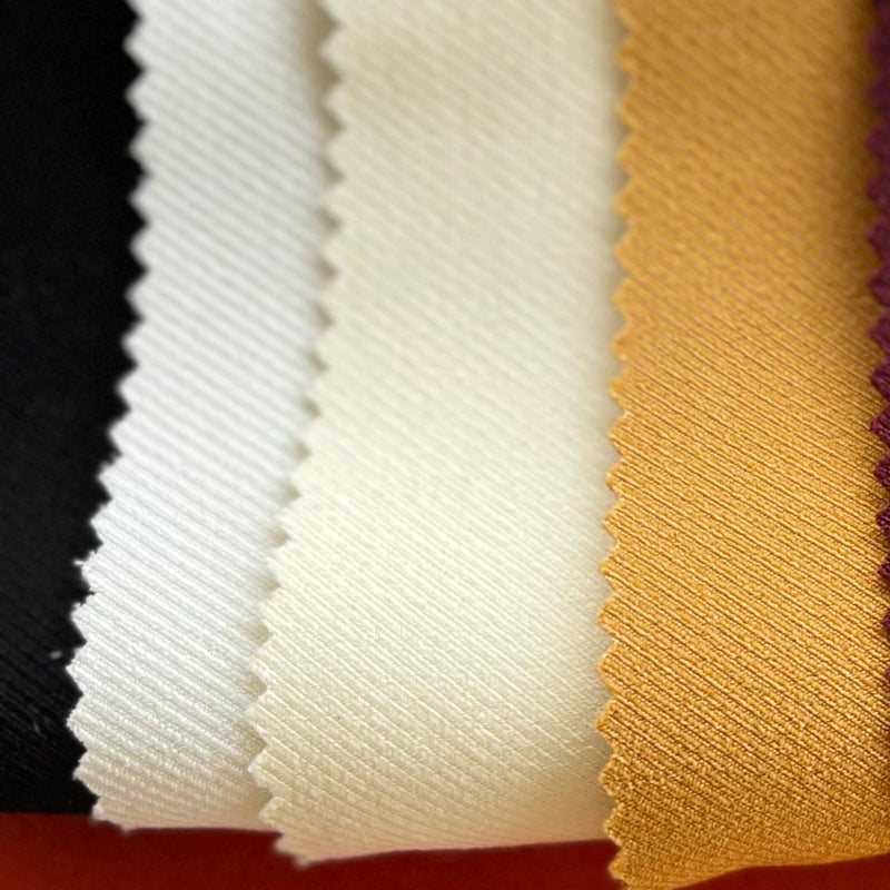      Tecidos_lisos_cores_pastel_Tecido_estruturado_Preto_Tecidos_Texland